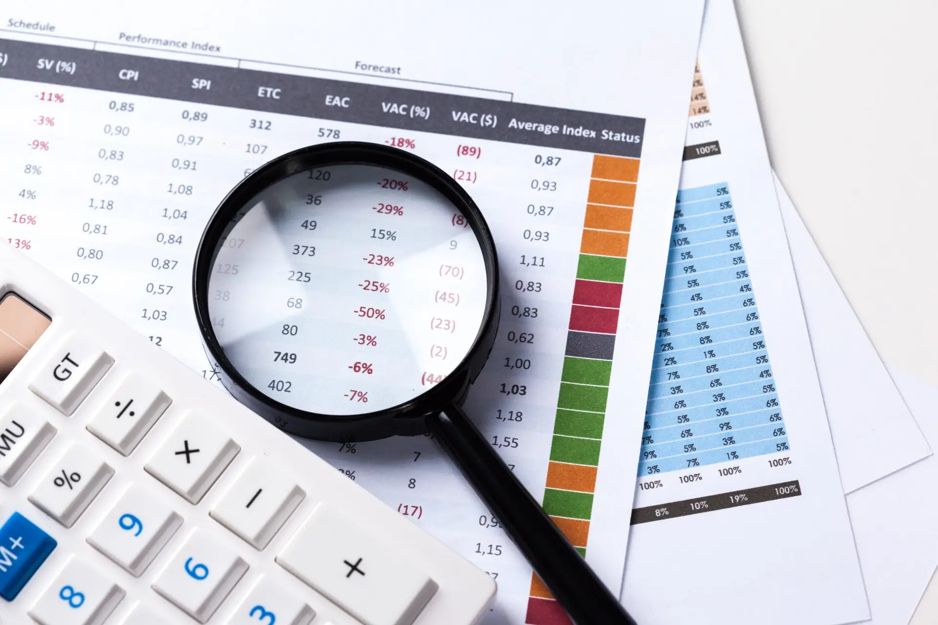 work with a magnifying glass, a calculator and papers